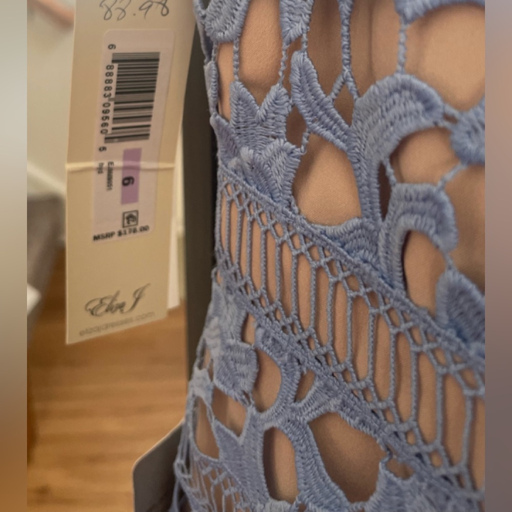 Brand new dress that can be worn to a wedding,  cocktail party or casual events.